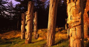 Totem Poles at Ninstints, Haida Gwaii. Photo HelloBC